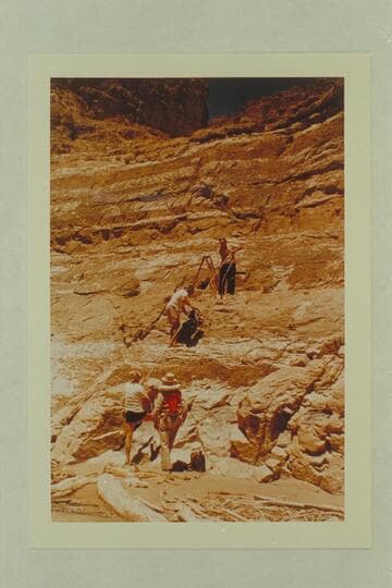 Rigging the camera.  Paradise Canyon.  Gordon Avil and Jim Algar on beach.  Dick Kelley and Doc Reed on cliff