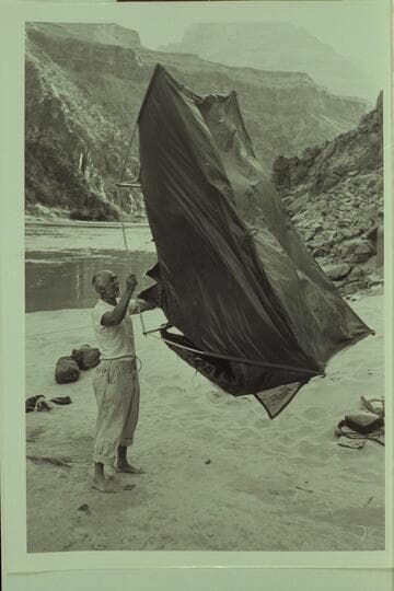 Frank Masland shakes the same from his Masland tent; Diamond Creek