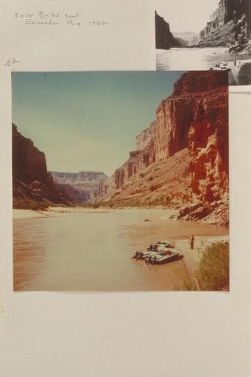 The three aluminum outboard powered boats moored at the Canyon below Kwagunt Rapid.  Taylor walks on the beach