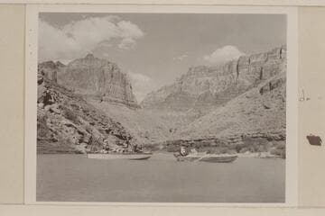 The two outboard boats cruising in the lagoon at the mouth of the Little Colorado River.  In the lefthand boat, the "Twin," are Daniels, Juan and Sanderson.  In the "June Bug" are Jordan and Macdonald