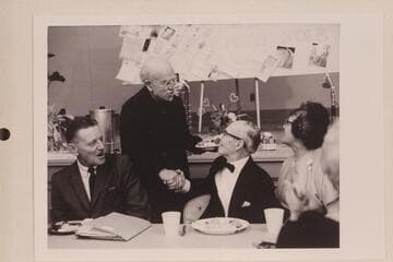 Howard Stricklin and Edith Kolb Lehnert are amused at the greeting and congratulations to Emery Kolb by Dock Marston.  Emery's birthday party.  Grand Canyon