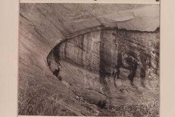 Belknap and Visbak in back of the inner arch at Hawkeye Arch