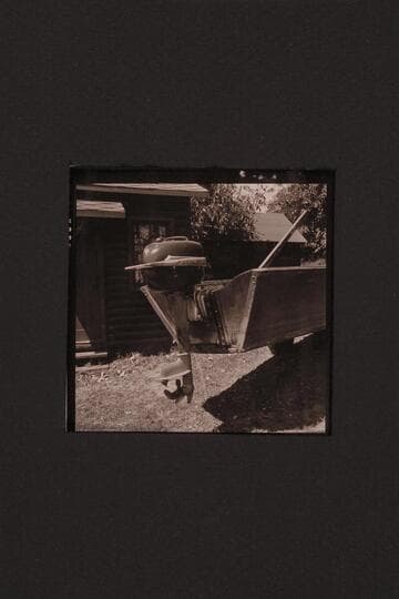 Rogue River type of boat.  Two boats at Agness on the Rogue River.  Outboard motor on stern of one boat