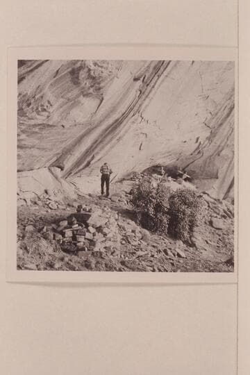 Photographing the ruins in the large cave in upper Surprise Valley