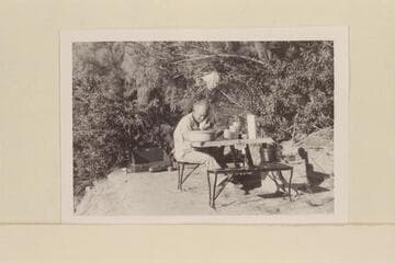 Harry Aleson digs the sand from his ear.  Camp above Smith Fork.  Mile 132