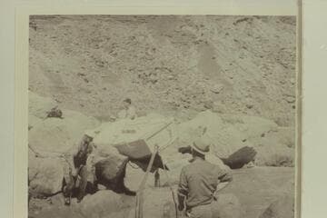 Portage of one of the Caltech boats at Badger Creek Rapid