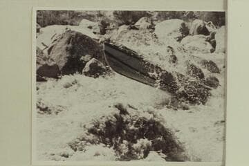 Rod Sanderson pilots the "Twin", Daniels is passenger.  Badger Creek Rapid