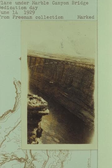 Plane under Marble Canyon Bridge.  Dedication day.  From Freeman collection.  Marked USED Oct 1929