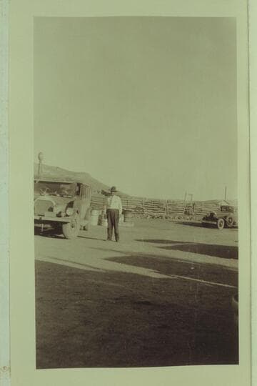 Mr. Flake and the bus between the Grand Canyon and Navajo Bridge at the time of the Bridge dedication.  Freeman photo