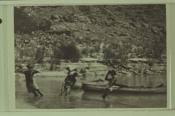 Stuck in the mud at Lees Ferry.  The boats are the canvas folding units rented from Dave Rust
