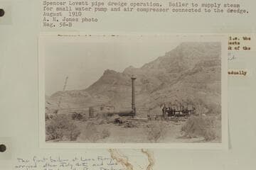 Spencer Lovett pipe dredge operation.  Boiler to supply steam for small water pump and air compressor connected to the dredge