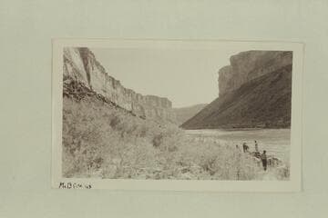 Looking upstream at Soap Creek camp on Colorado River.  The Bus Hatch pontoons at the beach.  Lees Ferry gauge:  26,200 cfs