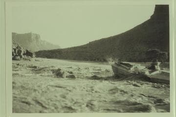 Bert Loper in rapid near McPherson Ranch.  Probably Mile 40.  McPherson Ranch is Mile 39.4 left bank.  The maps show a rapid below at Florence Creek, Mile 38.8