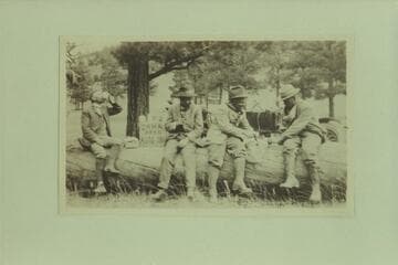 The Zahn party stopping for lunch at the pass over the arm of the San Francisco Mountains.  They took their Franklin car from Los Angeles to the Zahn Mine on the San Juan River in 1915, Sep