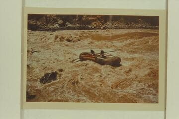 Pontoon No. 1 in Vulcan Rapid.  Bruce and Clarke Lium at the oars