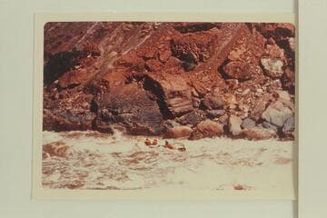 Deck-Boat 2/3rds down Vulcan Rapid after superstructure had let go in the first hole and the motors were dead.  The boat ran bow-on