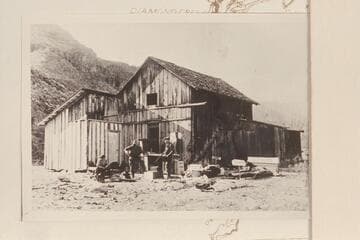 Crew demolishing the Farlee Hotel at the mouth of Peach Springs Wash