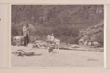 Camp gear and boats at mouth of Tapeats Creek