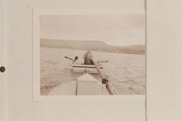 Boats being towed into Pierces Ferry by Greene.  Anne Desloge lies on deck with Al Milotte facing her