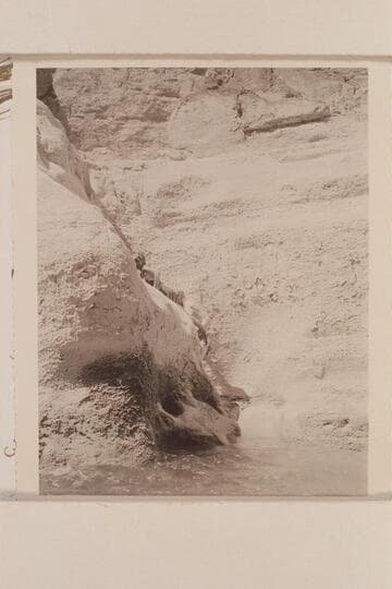 Travertine encrustations at mouth of Supai Creek.  Margaret Marston and Joe Desloge climbing