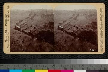 Horatio N. Rust sitting on rock overlooking the Grand Canyon