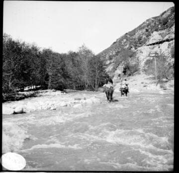 People riding horses in Santa Ana River Canyon along the transmission line