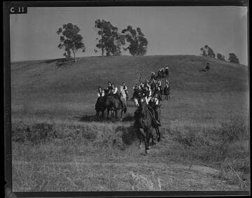 Santa Monica Lancerettes riding in a field