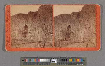 Alcove in Palisades, Ten Mile Cañon. [With railroad tracks at right of image]