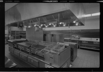 Institutional or commercial kitchen and cafeteria dining area
