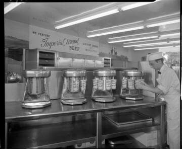 Cook making milkshakes at fast food resturant