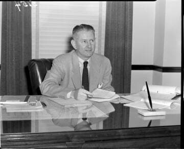 Man seated at desk