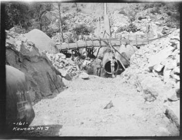 A construction crew placing a siphon pipe at Kaweah #3 Hydro Plant