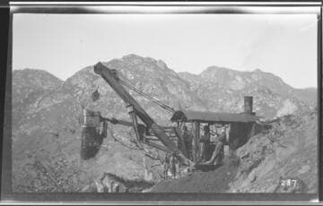 A construction crew on a steam shovel at work at Kaweah #3 Hydro Plant
