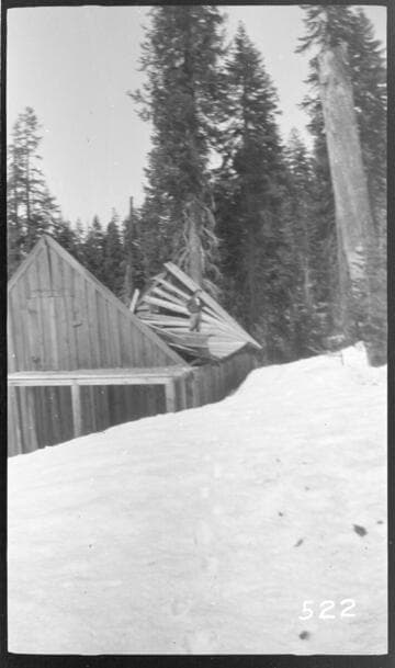 A wooden shack in a snow scene at Wolverton Reservoir