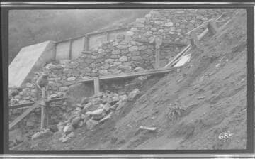 A man repairing a ditch at Kaweah #3 Hydro Plant