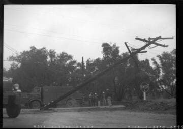 Unknown line crew at scene of downed power line at L&M Ranch