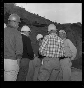 Group of men touring Big Creek and the Mammoth Pool project site