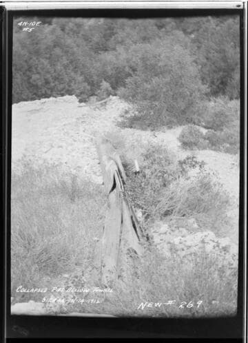 Sierra pipeline [penstock] showing pipe below tunnel in collapsed condition