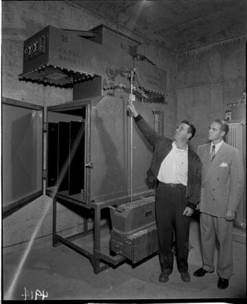 Men looking at equipment