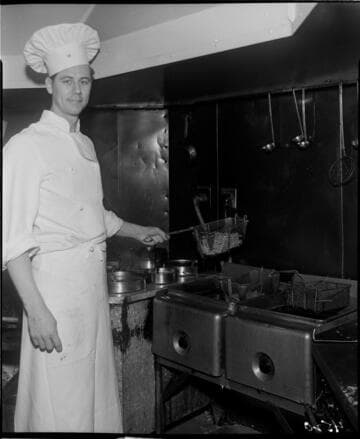 Chef using electric fryer