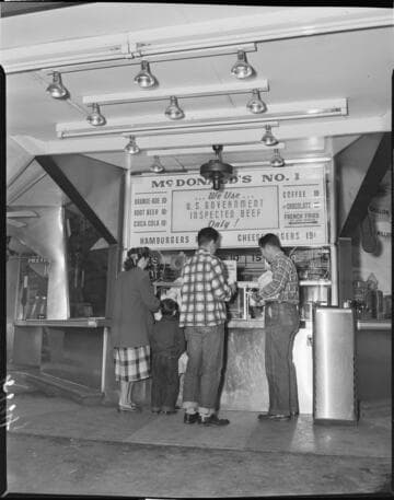 Close-up of customers at the service counter