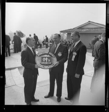 Ribbon cutting and presentation of Medallion Home award