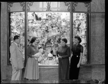 Christmas Dolls in General Office window