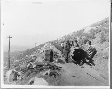 Crew constructing the redwood-stave flowline for Bishop Creek Powerhouse #4 (1904-1905) - Nevada Mining, Milling and Power Co