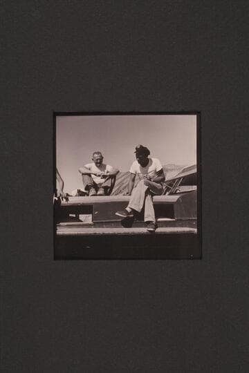 Taylor and Jordan talk it over.  End of 1954 Grand Canyon cruise.  Gods Pocket on Lake Mead