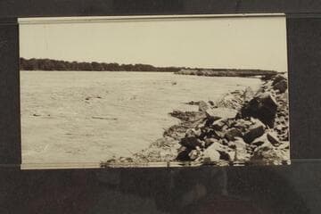The crest of the June flood of the Colorado beating against the Pescadero Dam