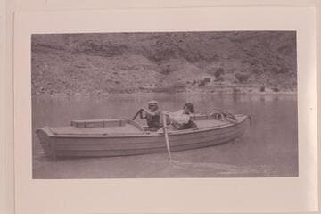 Catherine Pahl and Edith Kolb in USGS boat at Lees Ferry.  Photo at Huntington Library