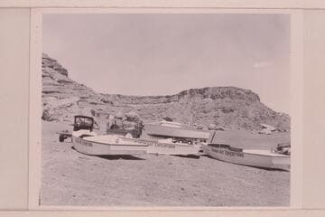 Portion of the Wright-Rigg fleet at Art Greene's Cliff Dweller's Lodge before launching at Paria Riffle