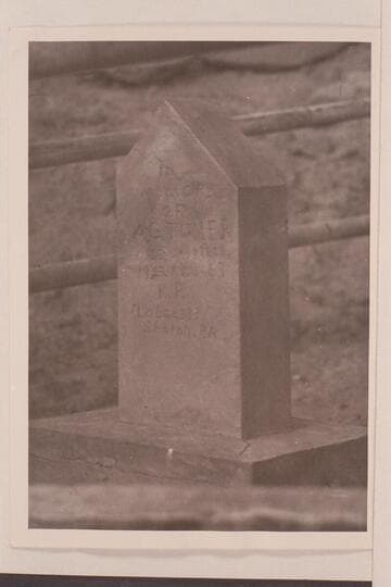 Headstone of Alonzo G. Turner's grave on California Bar in Glen Canyon.  Turner died on the Bar and was buried in a trench that he had  himself dug.  Arth Chaffin cast the headstone at Hite, brought it down by boat, erected it on a cement base