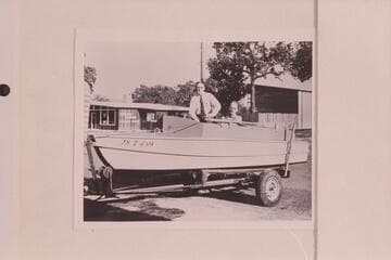 Ed Hudson and Ed Nichols in the 16 foot inboard boat "FINALLY" with a 65HP Willys engine